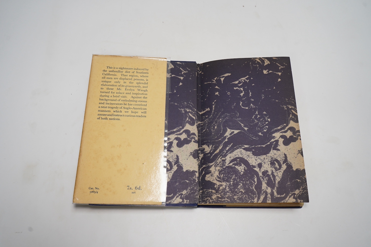 Waugh, Evelyn - The Loved One: An Anglo-American Tragedy, illustrated by Stuart Boyle, original blue cloth, spine lettered in gilt, in unclipped pictorial dust jacket, Chapman & Hall, London, [1948]
